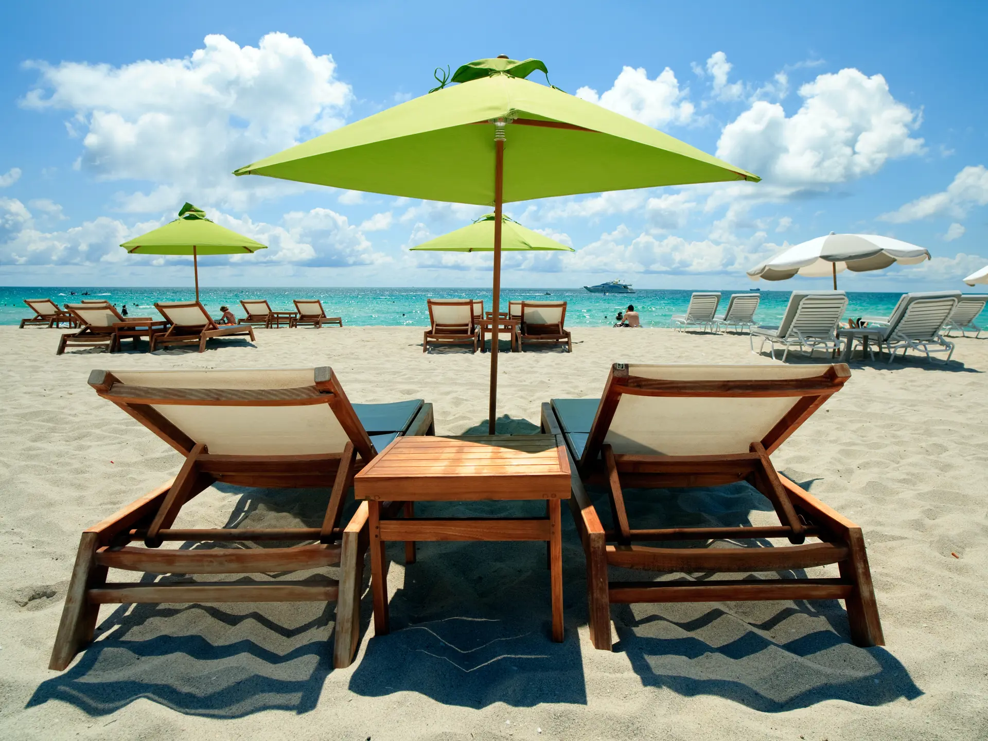 shutterstock_53590102 South Beach Lounge Chairs and Umbrellas.jpg
