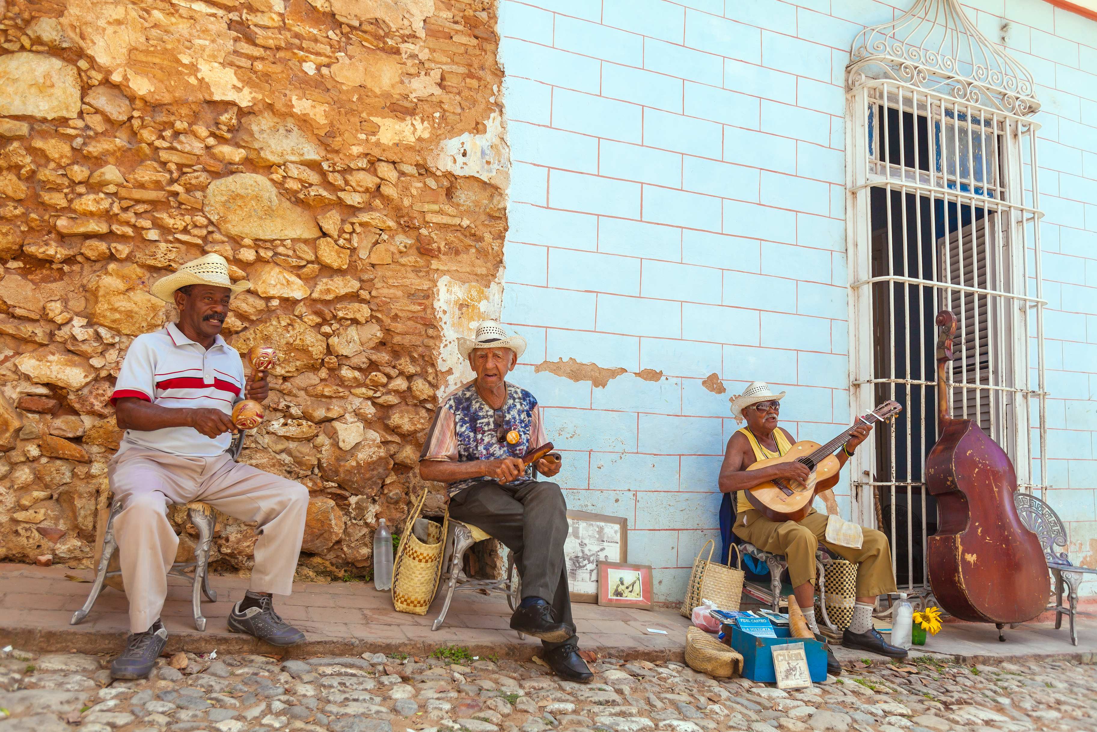 shutterstock_589667297 TRINIDAD, CUBA - MARCH 30, 2012 Street musicians perform.jpg