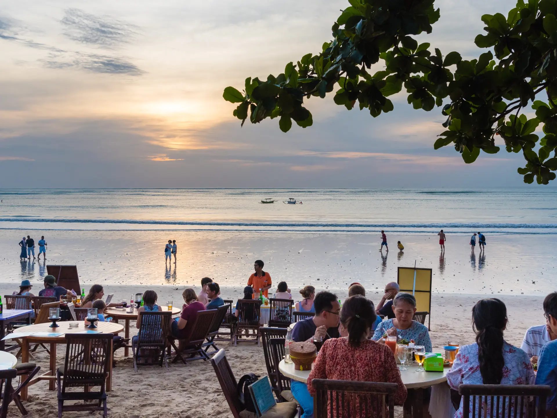 shutterstock_720684154 Jimbaran tropical beach is a main popular balinese attraction, famous for the clear, aqua blue water and sea food.jpg