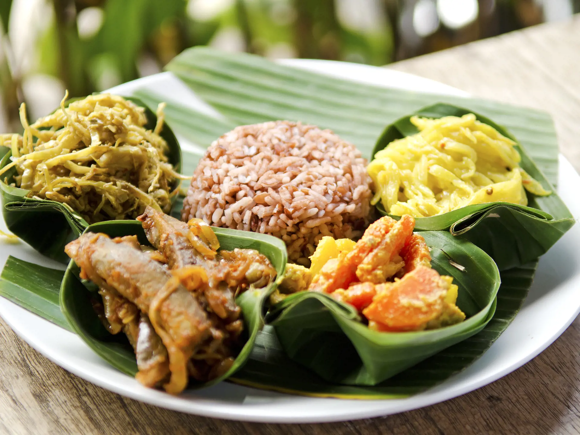 shutterstock_77400334 indonesian food in bali, several curries and rice.jpg