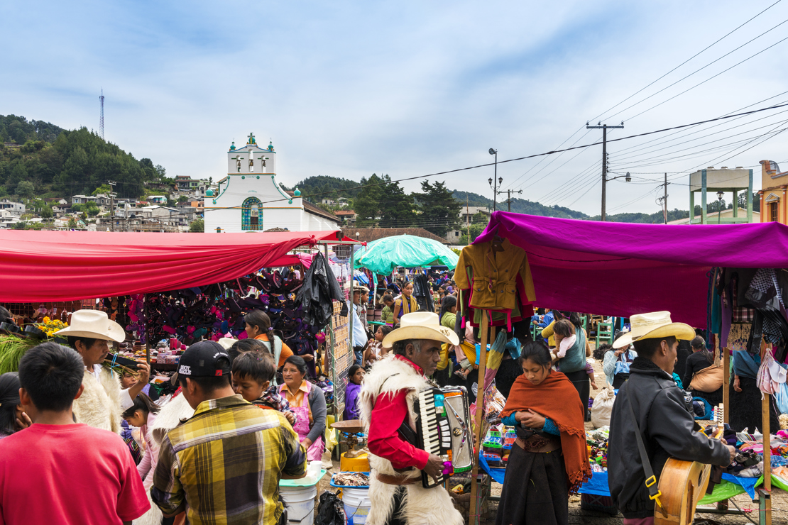 shutterstock_548464801 Local people in a street market in the town of San Juan Chamula.jpg
