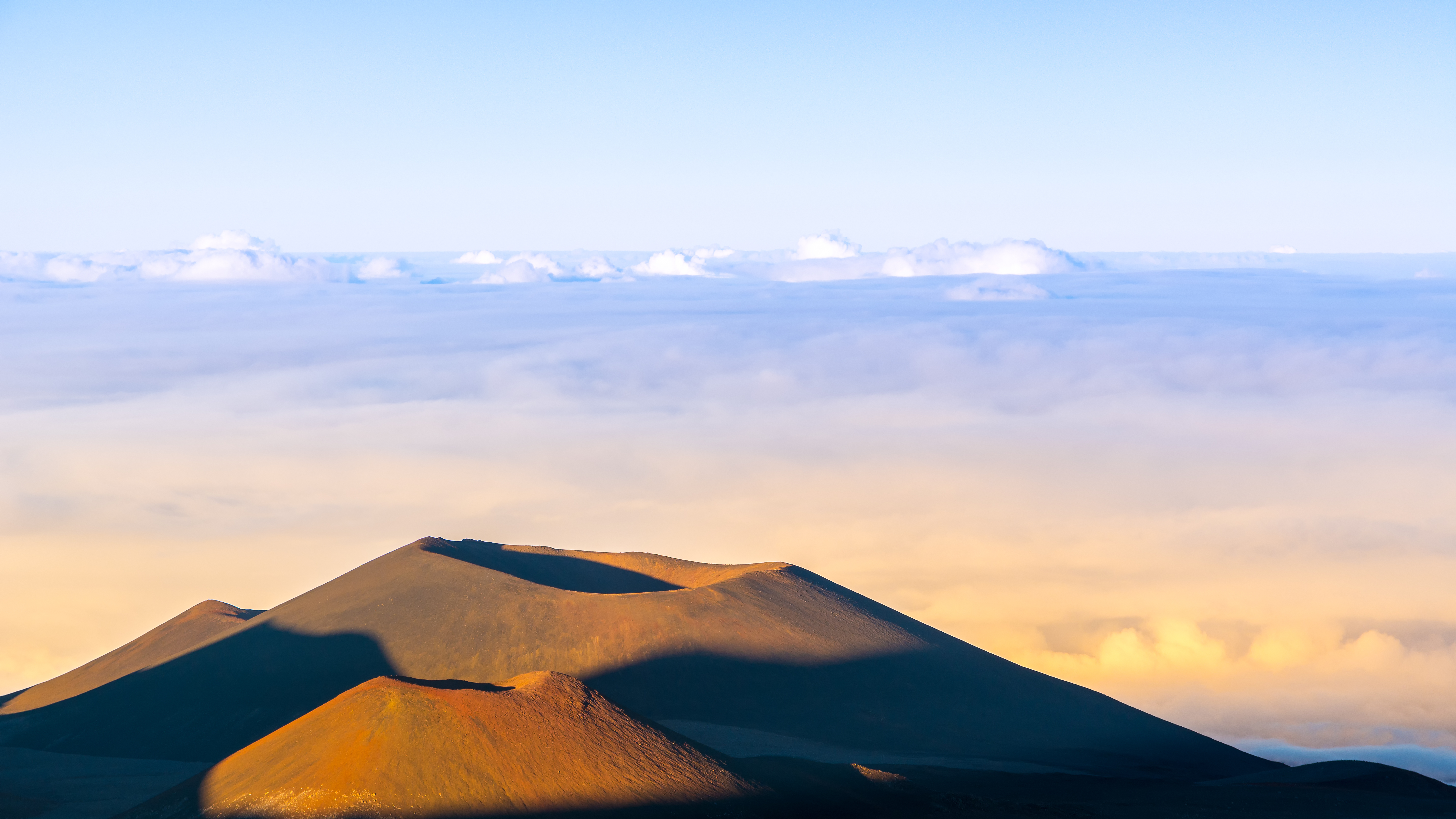 View of Volcano craters from Mauna Kea Mountain summit at sunset, Big Island, Hawaii shutterstock_539981548.jpg