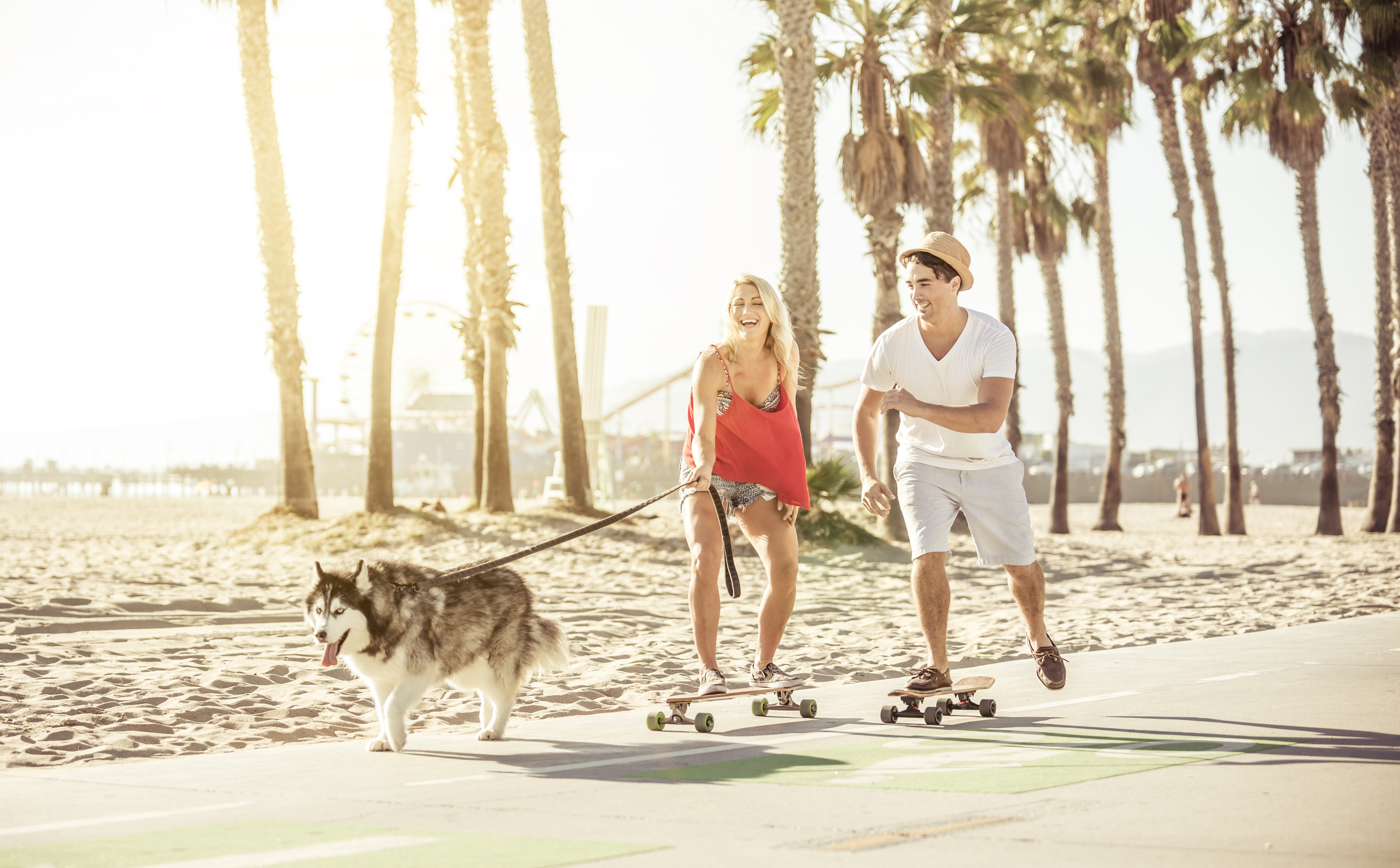 shutterstock_327532355 Couple having fun at Santa Monica Beach..jpg