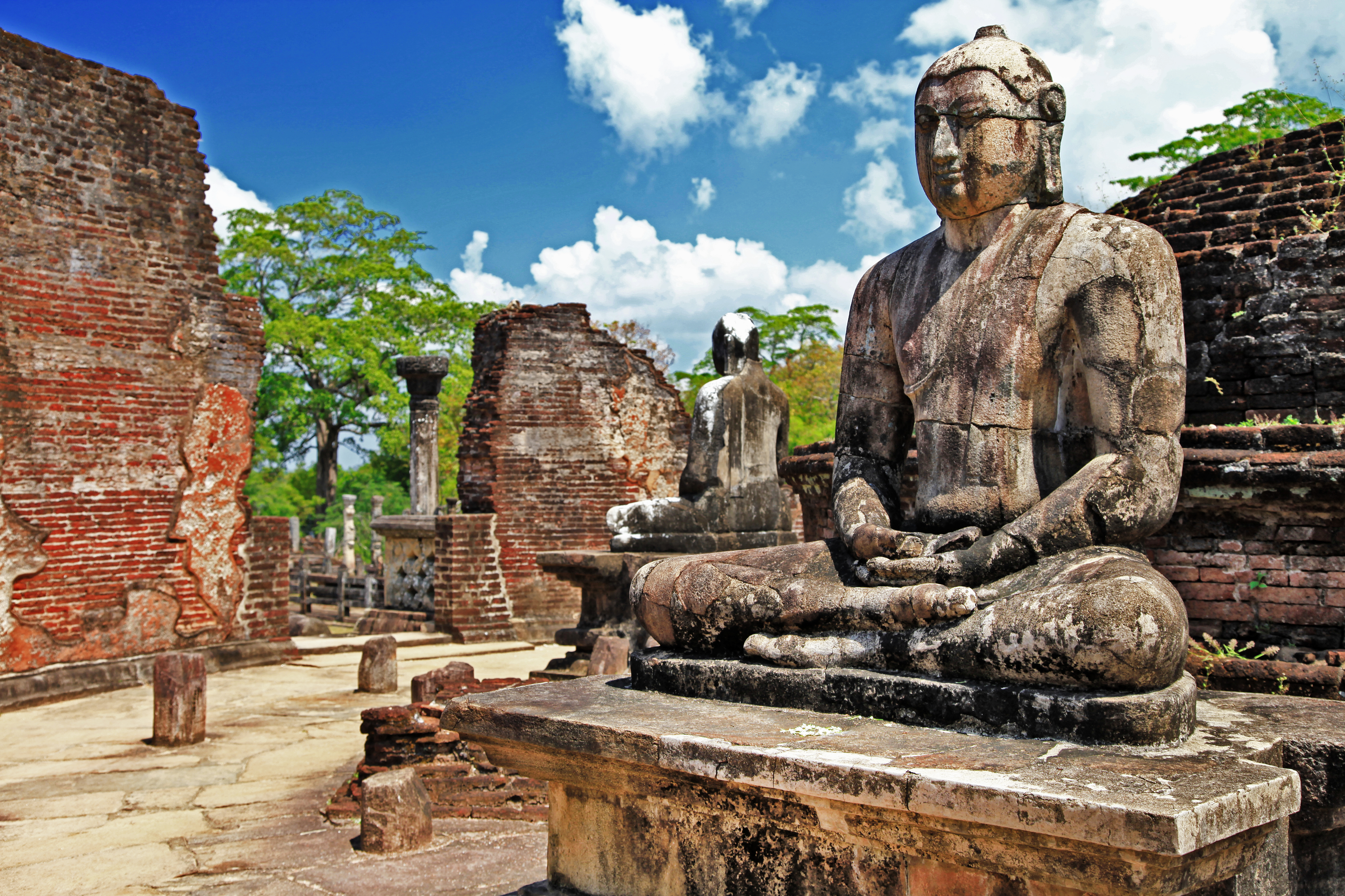 shutterstock_172070429 Buddha in Polonnaruwa temple - medieval capital of Ceylon,UNESCO.jpg