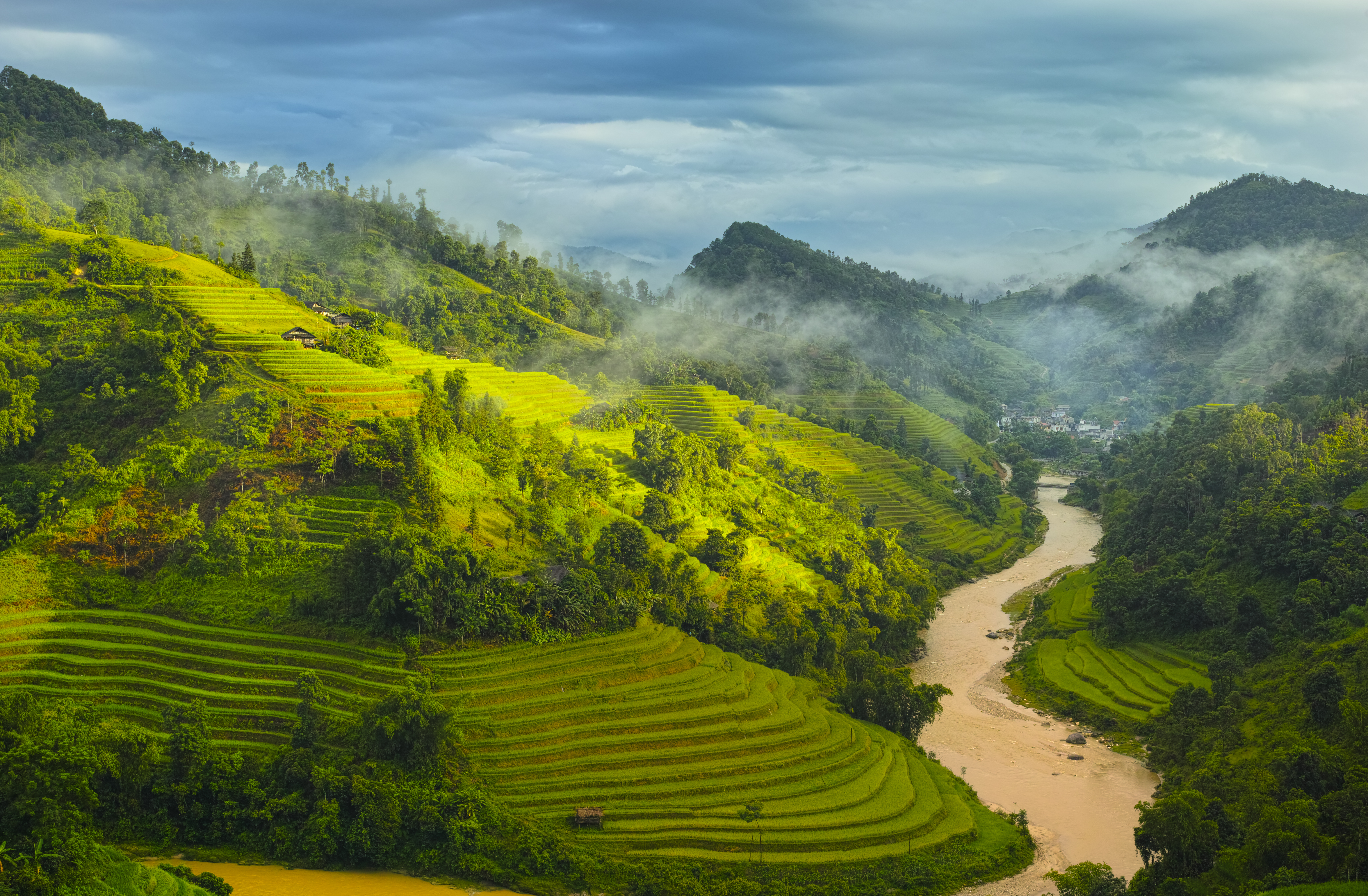 Terraced rice fields landscape with mountain, river, fog at Hoang Su Phi, Ha Giang, Vietnam.jpg