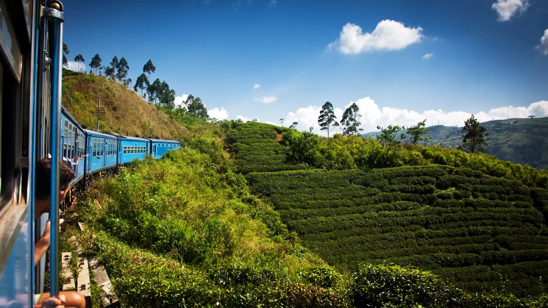 shutterstock_253468045 train from Nuwara Eliya to Kandy among tea plantations in the highlands of Sri Lanka.jpg