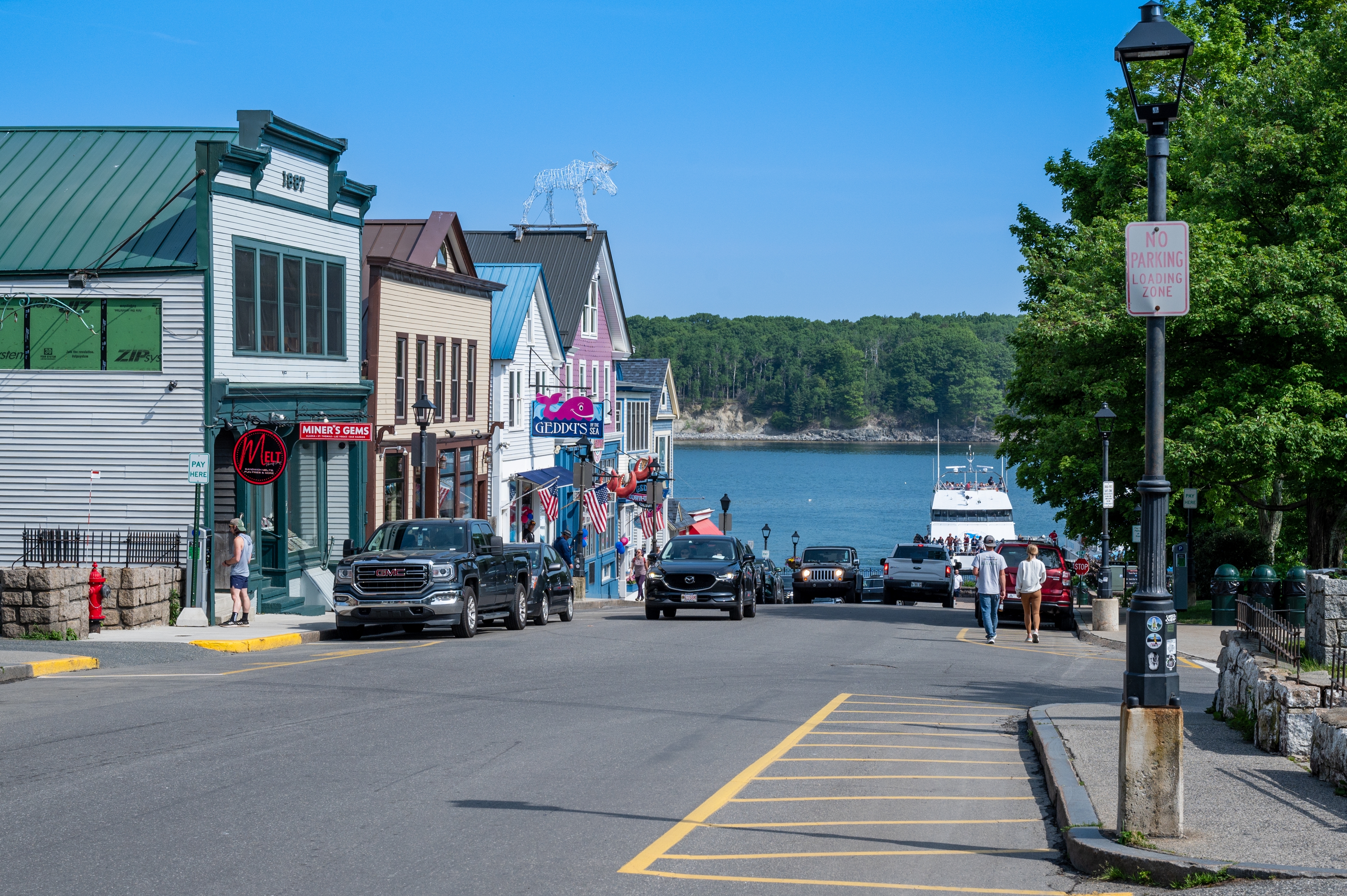 Shutterstock 2503022857 Bar Harbor, Maine, United States June 18, 2024 Main Street Leading To The Waterfront