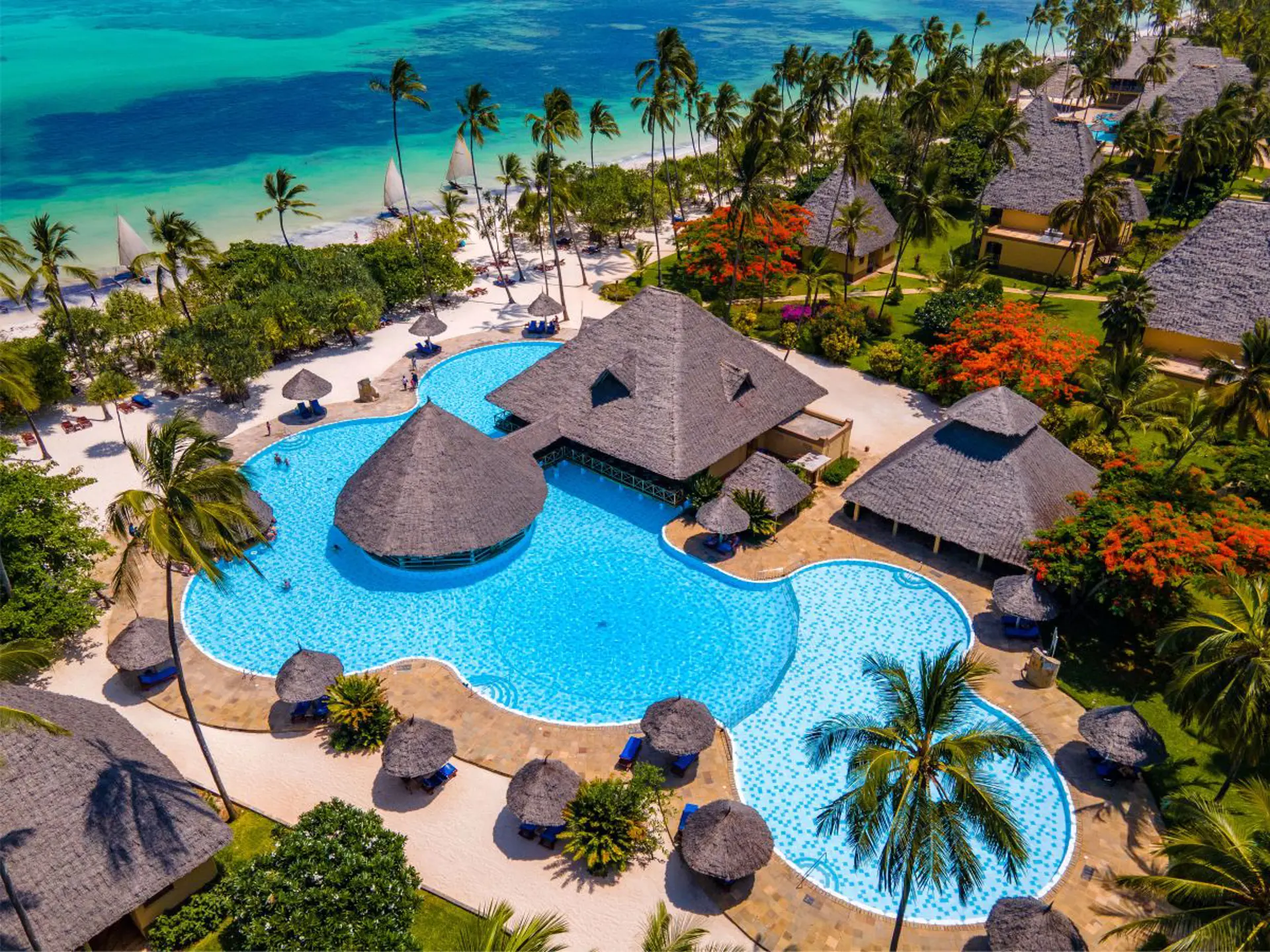 Neptune Pwani Beach Resort & Spa Zanzibar Aerial Swimming Pool,Beach And Tropical Vegetation