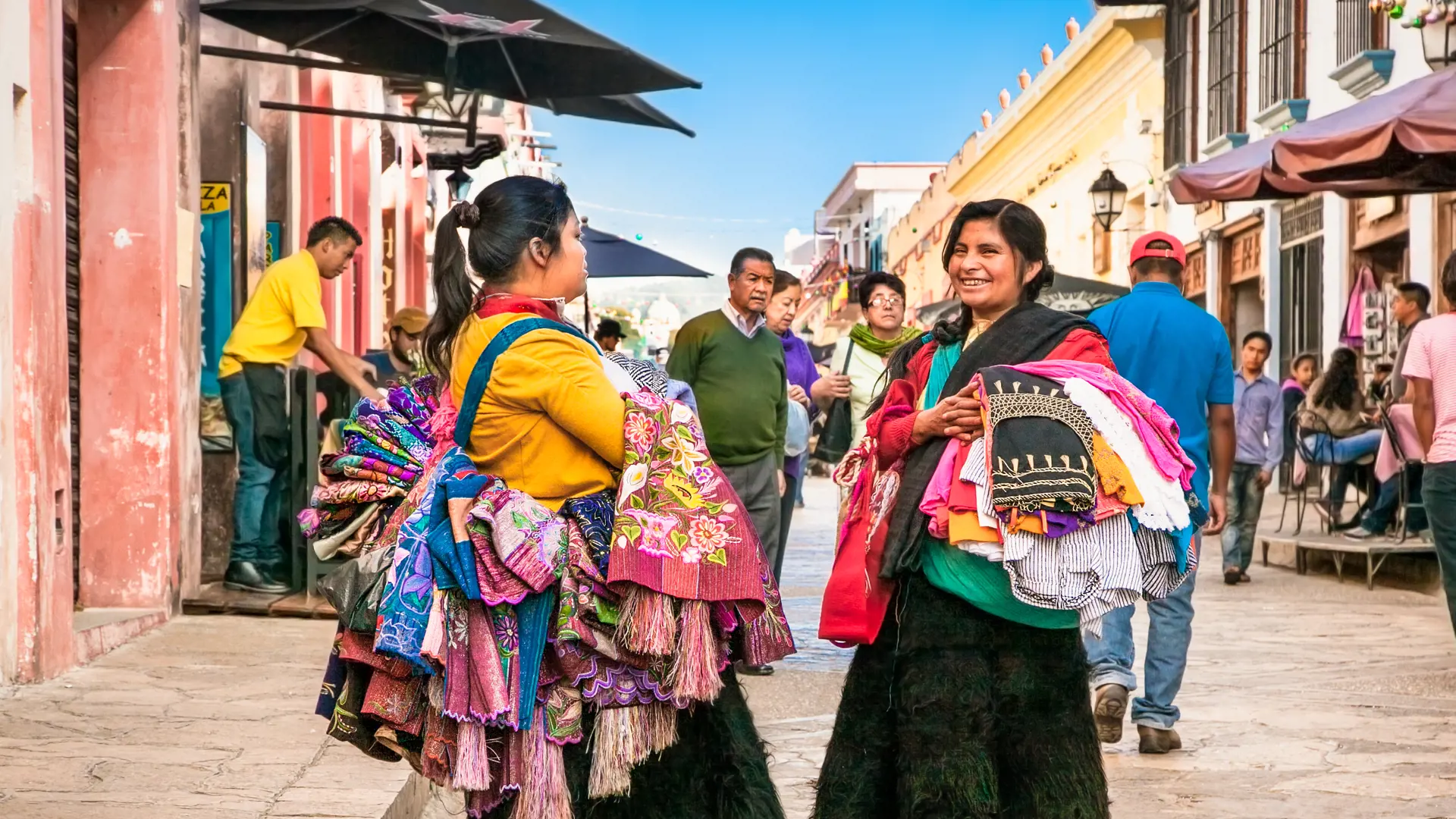 shutterstock_539658217 SAN CRISTOBAL, MEXICO-DEC 13, 2015Tzotzil Maya people saling the traditional clothes at street of San Cristobal de las casas.jpg