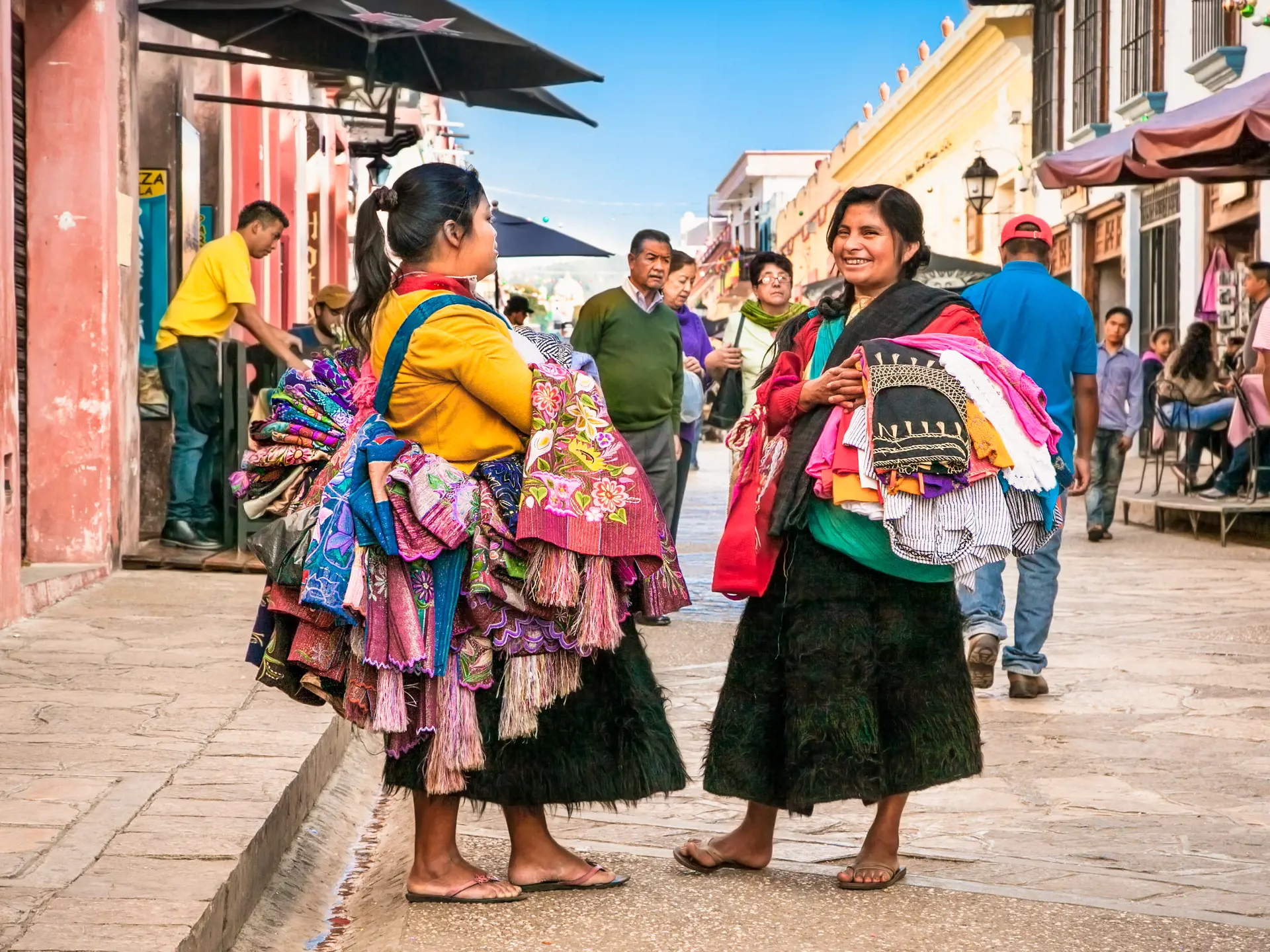 shutterstock_539658217 SAN CRISTOBAL, MEXICO-DEC 13, 2015Tzotzil Maya people saling the traditional clothes at street of San Cristobal de las casas.jpg