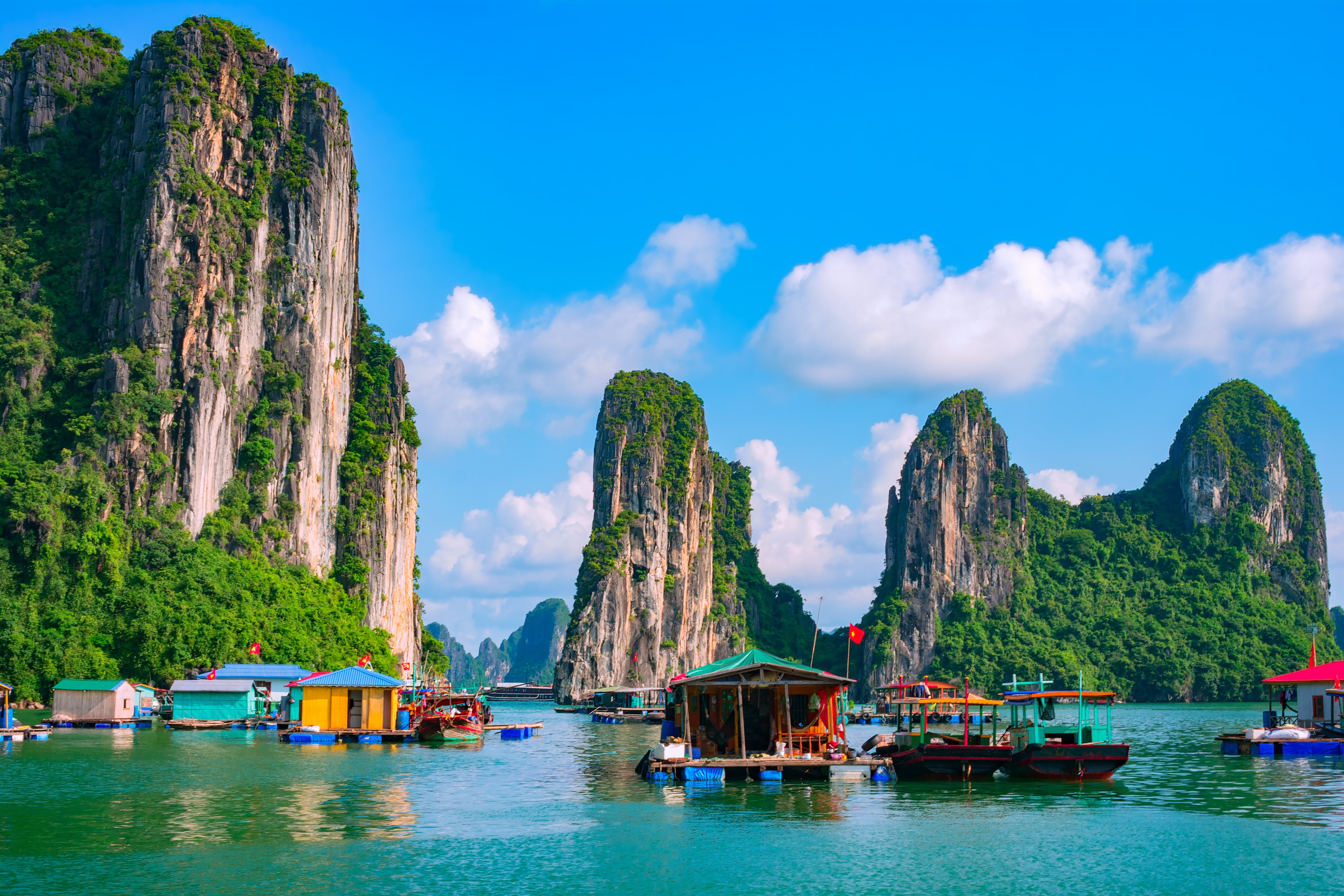 shutterstock_524159674 Floating fishing village and rock island in Halong Bay, Vietnam, Southeast Asia..jpg