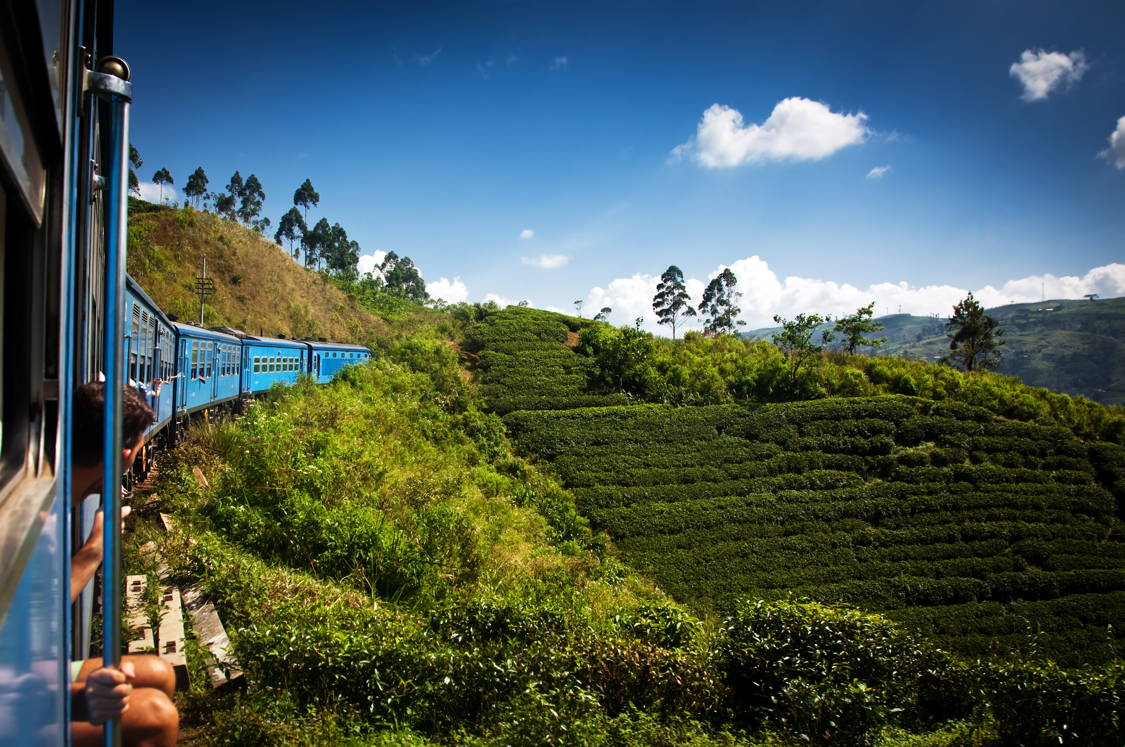 shutterstock_253468045 train from Nuwara Eliya to Kandy among tea plantations in the highlands of Sri Lanka.jpg