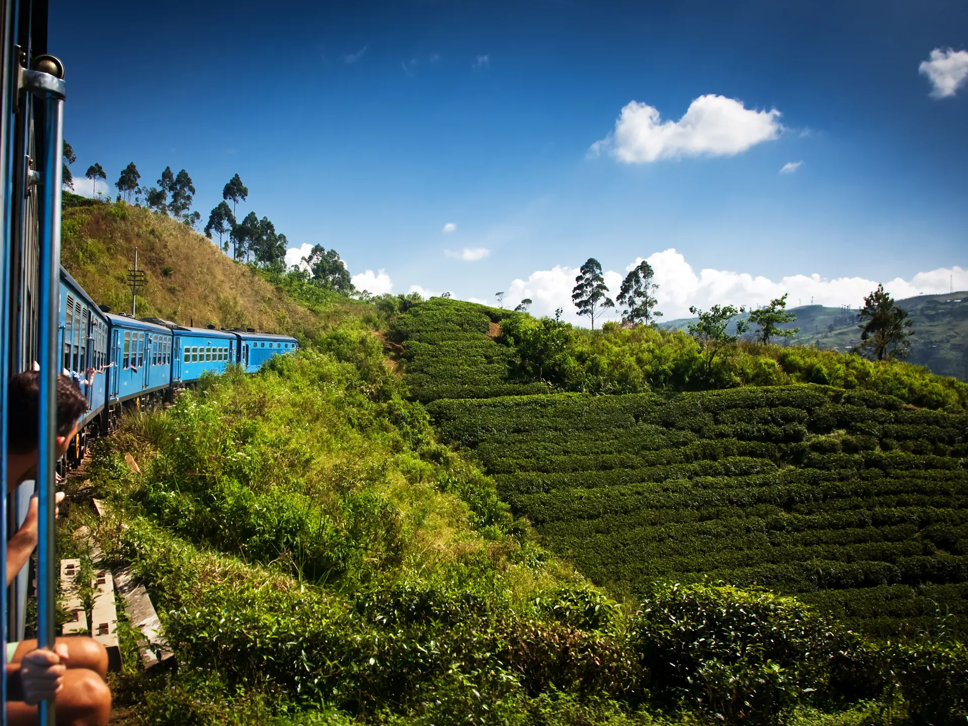 shutterstock_253468045 train from Nuwara Eliya to Kandy among tea plantations in the highlands of Sri Lanka.jpg