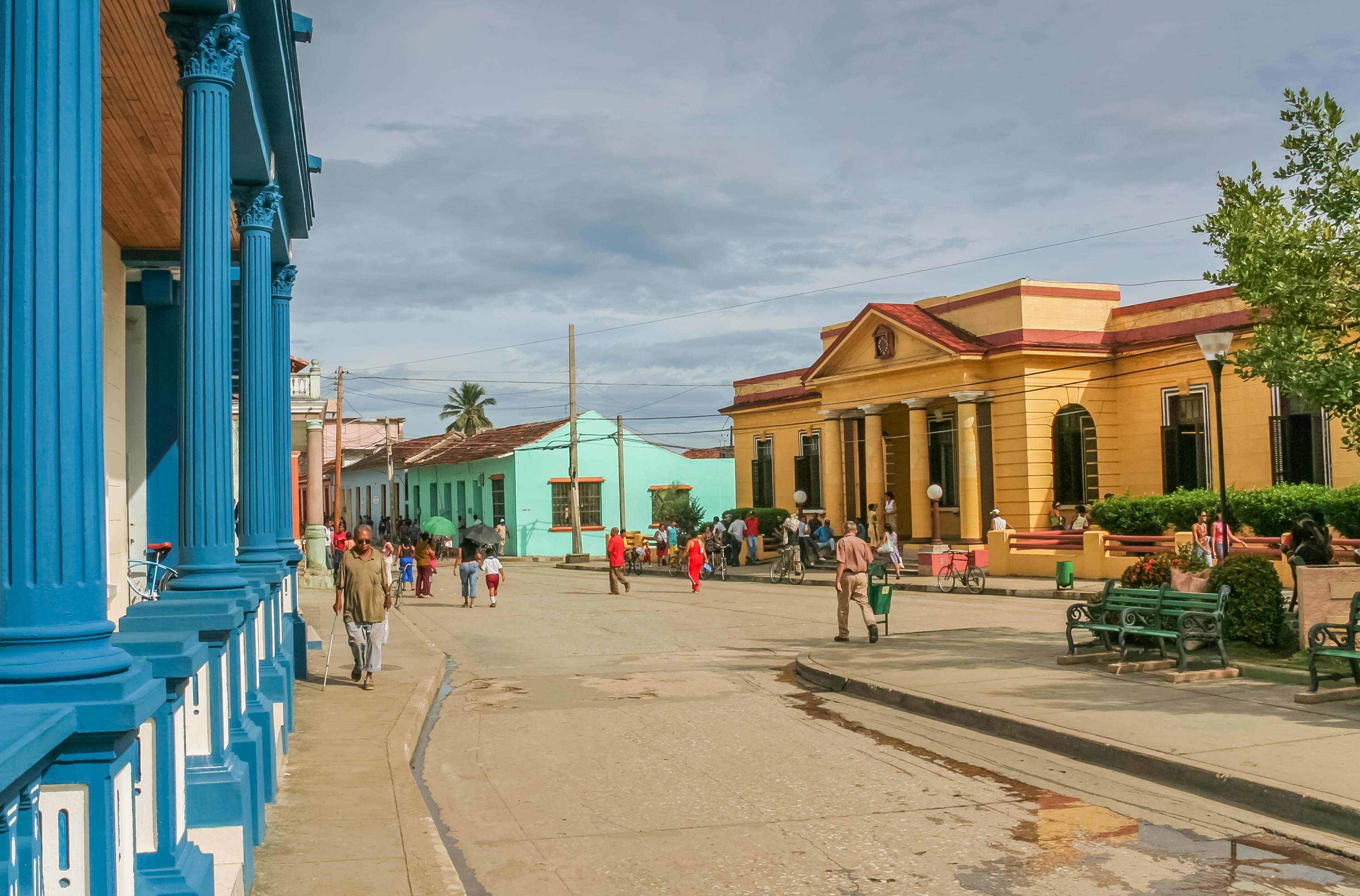 shutterstock_451773604 Street with colorful houses in colonial town Baracoa, Cuba.jpg