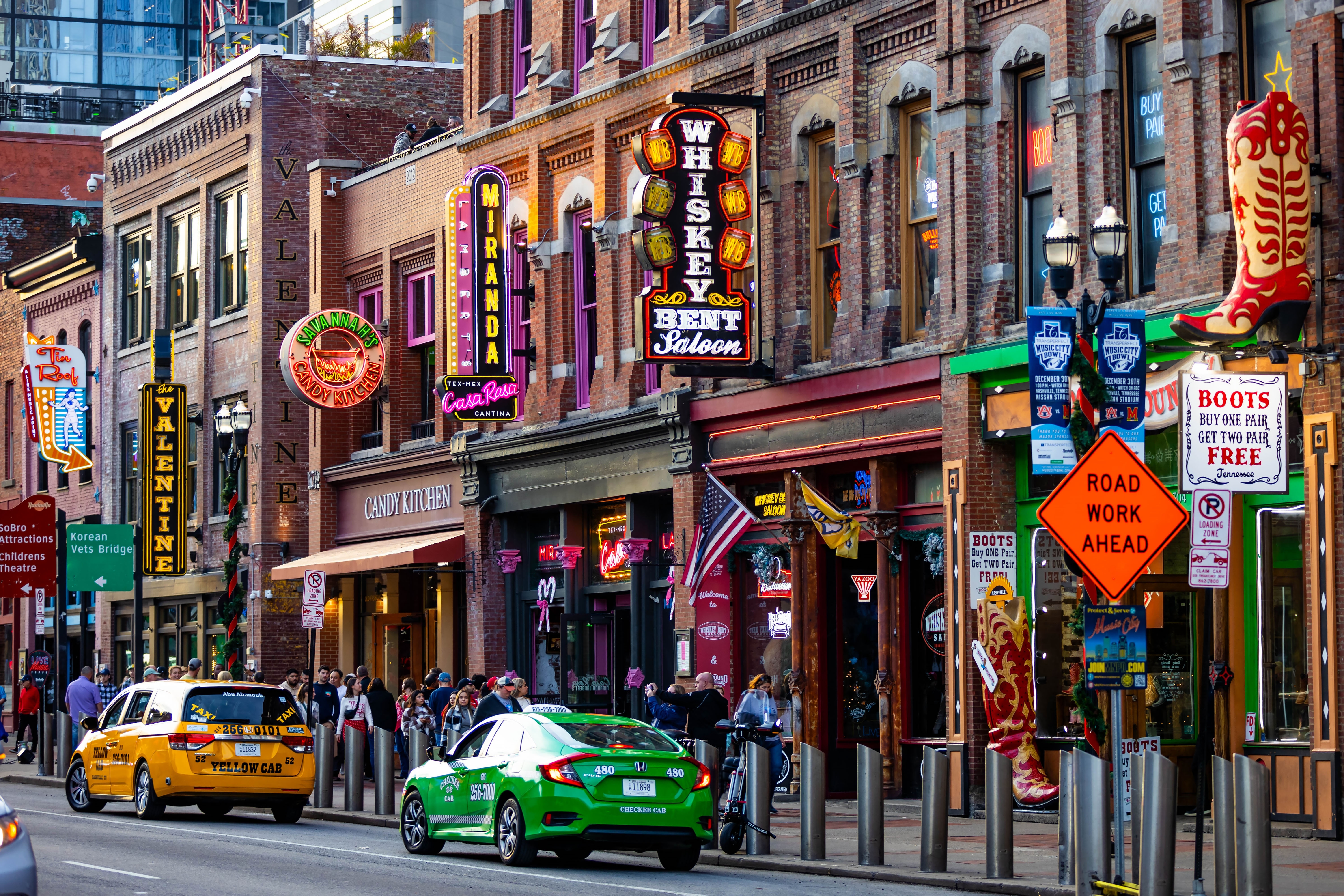 Shutterstock 2418513075 Nashville, TN, USA 12 24 2023 Famous Neon Signs Of Blues Clubs On Beale Street At Day In Downtown Nashville City Attraction