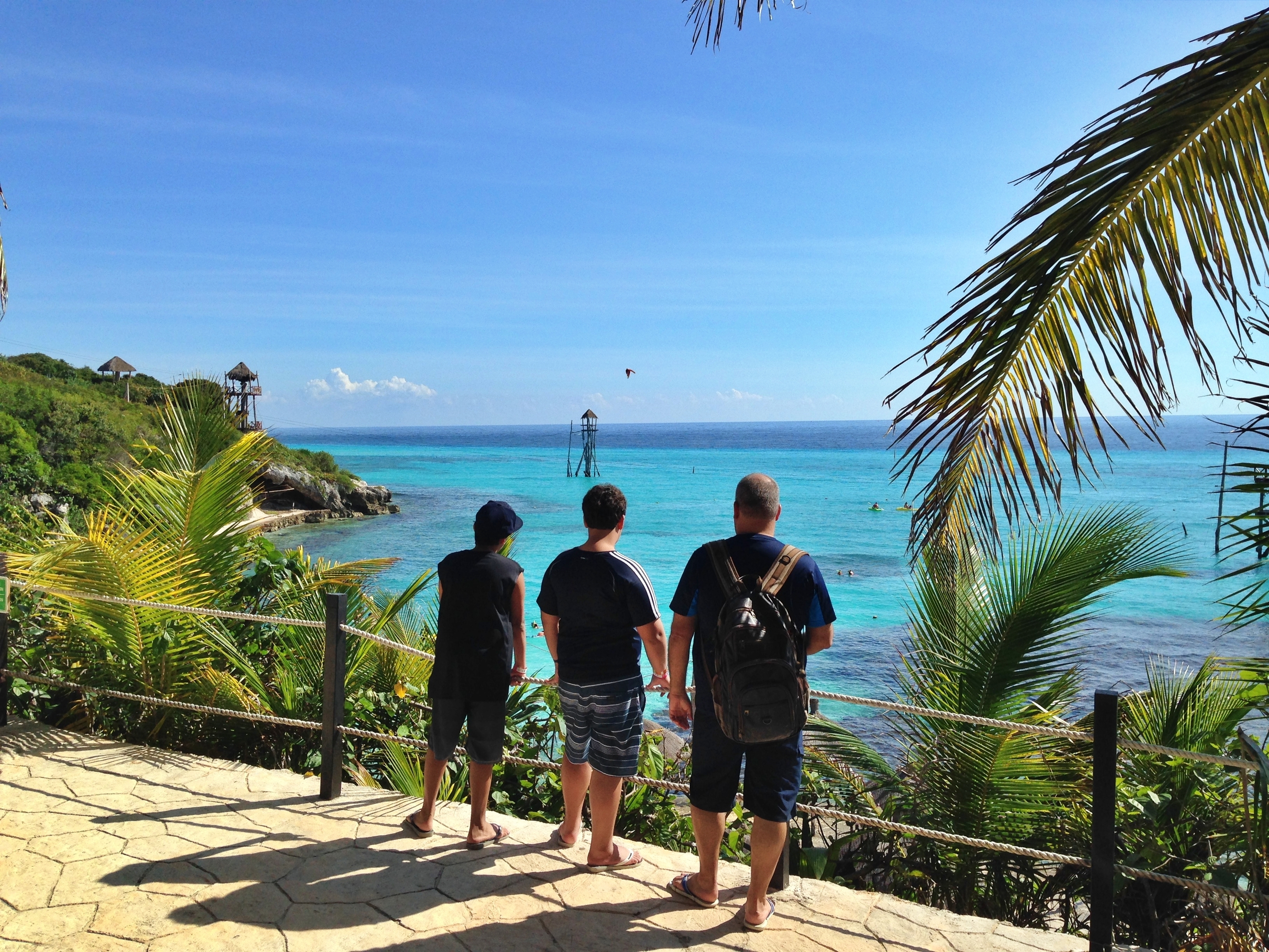 Shutterstock 2379873651 (Isla Mujeres Quintana Roo Mexico.January 16Th , 2015.Three People Admiring The View. Garrafon Park.)