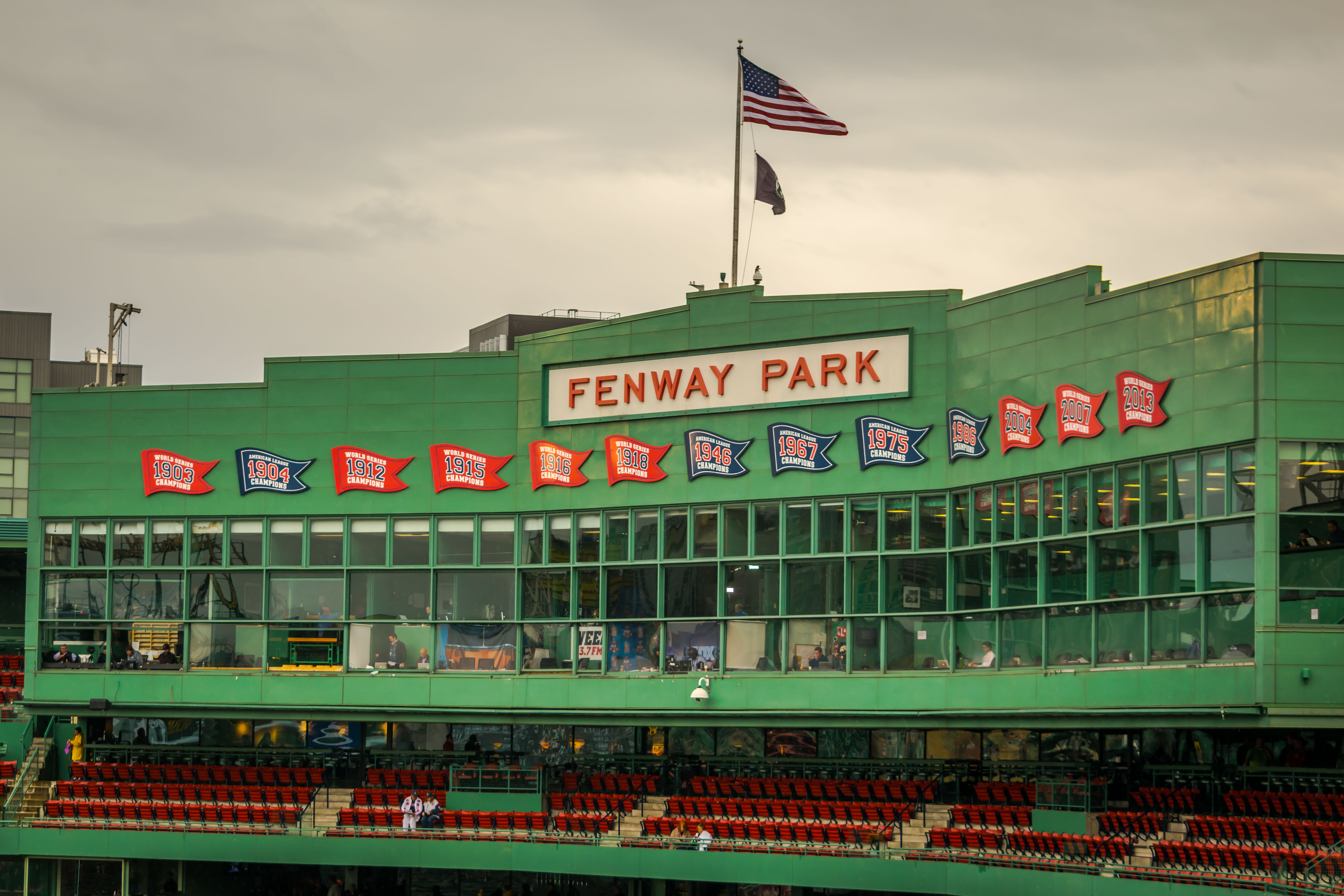 Shutterstock 1276985191 Boston, MA 93018 The Press Box At Historic Fenway Park, With Banners Representing The Team's Division And World Series Championships