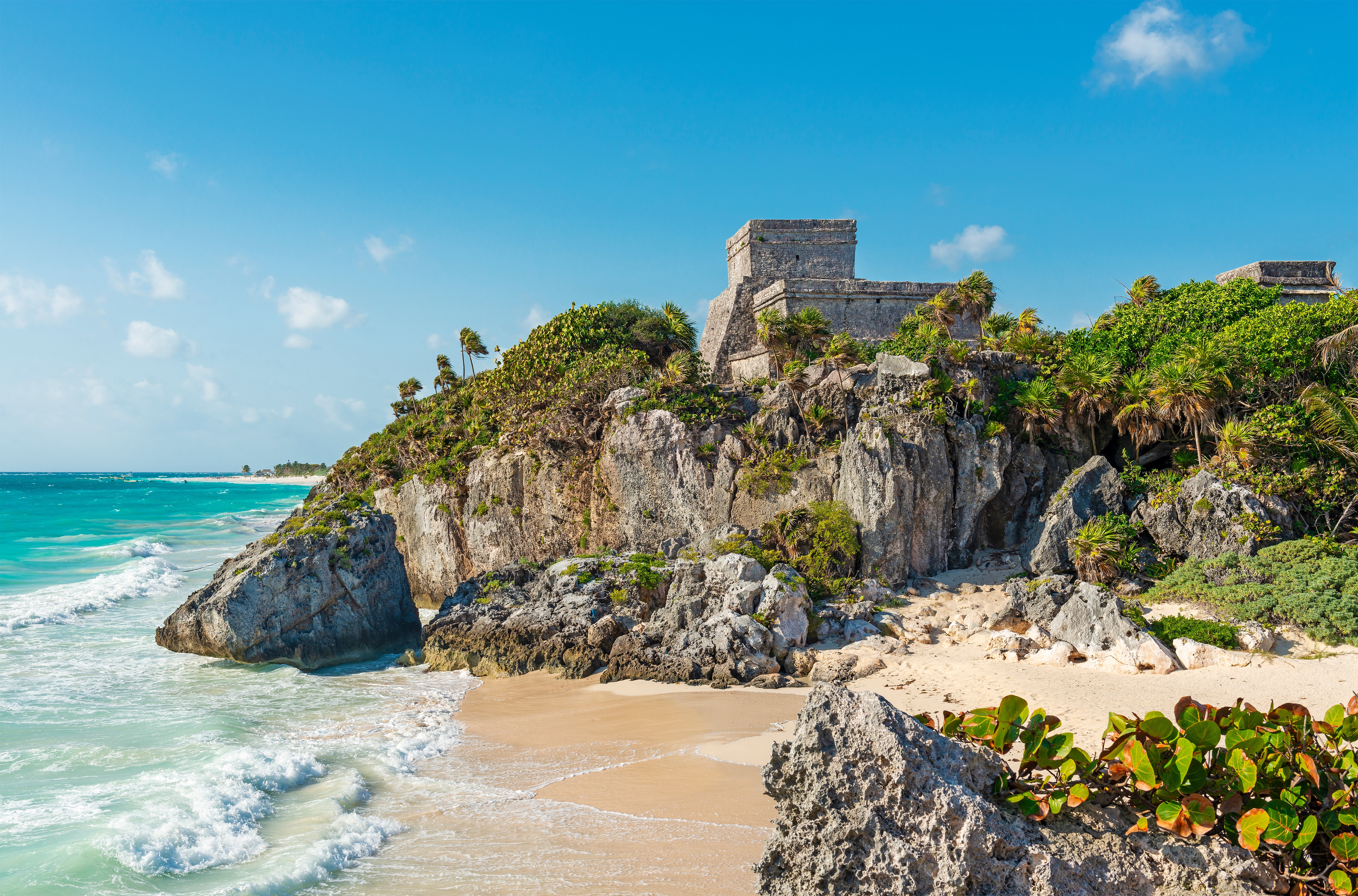 Shutterstock 2435903793 Tulum Beach And Maya Temple Ruins By Caribbean Sea, Yucatan, Mexico.
