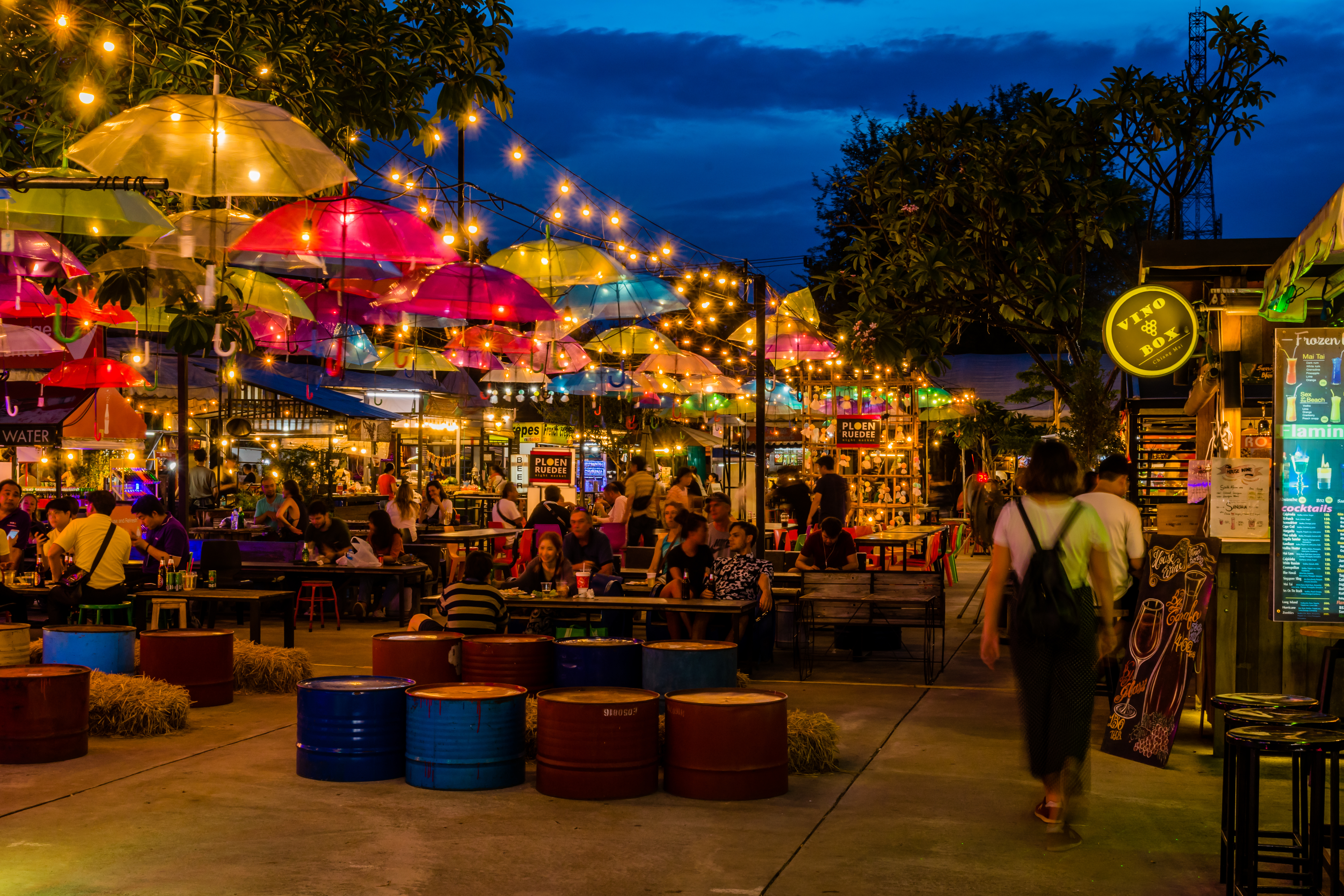 Shutterstock 1464983558 (Chiang Mai, Thailand; July 1, 2019; Unidentified People Eating And Relaxing At Night Bazaar.)