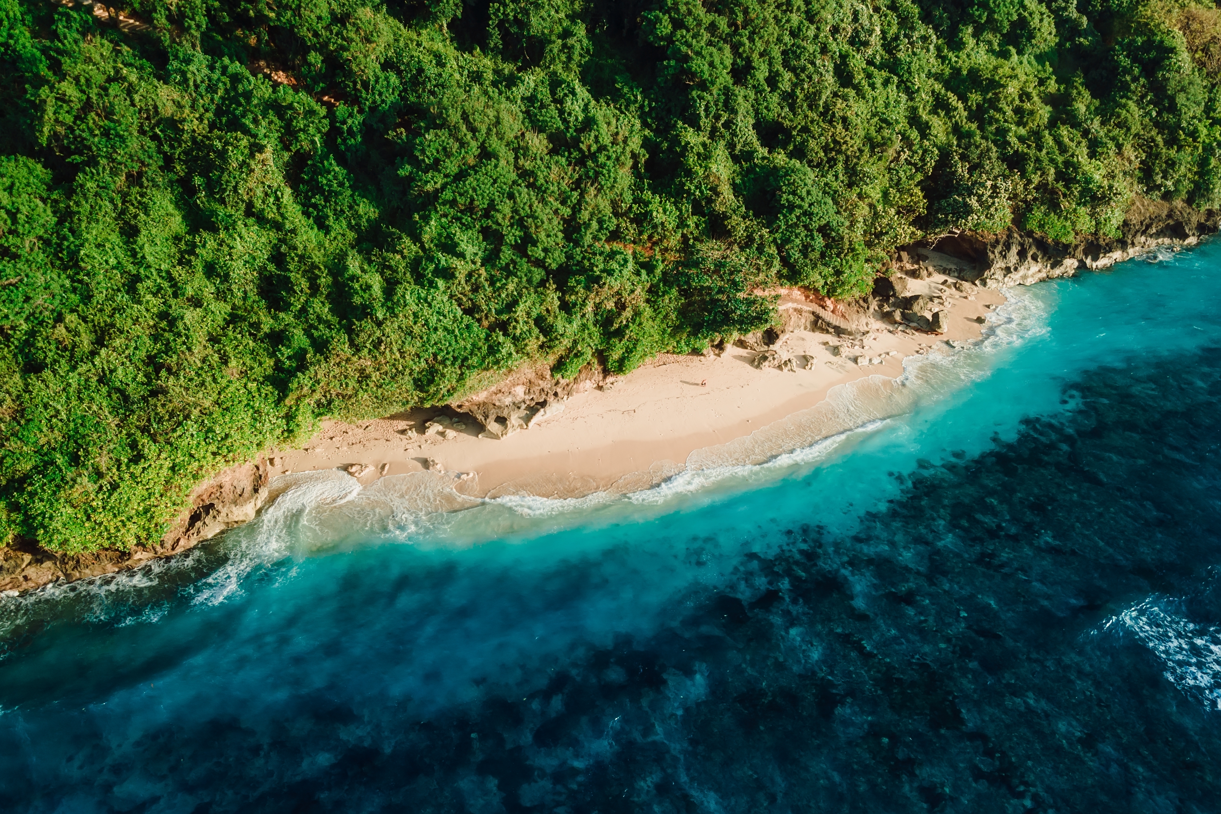 Shutterstock 2256840477 (Tropical Beach With Tropical Ocean In Bali. Aerial View Of Green Bowl Beach)