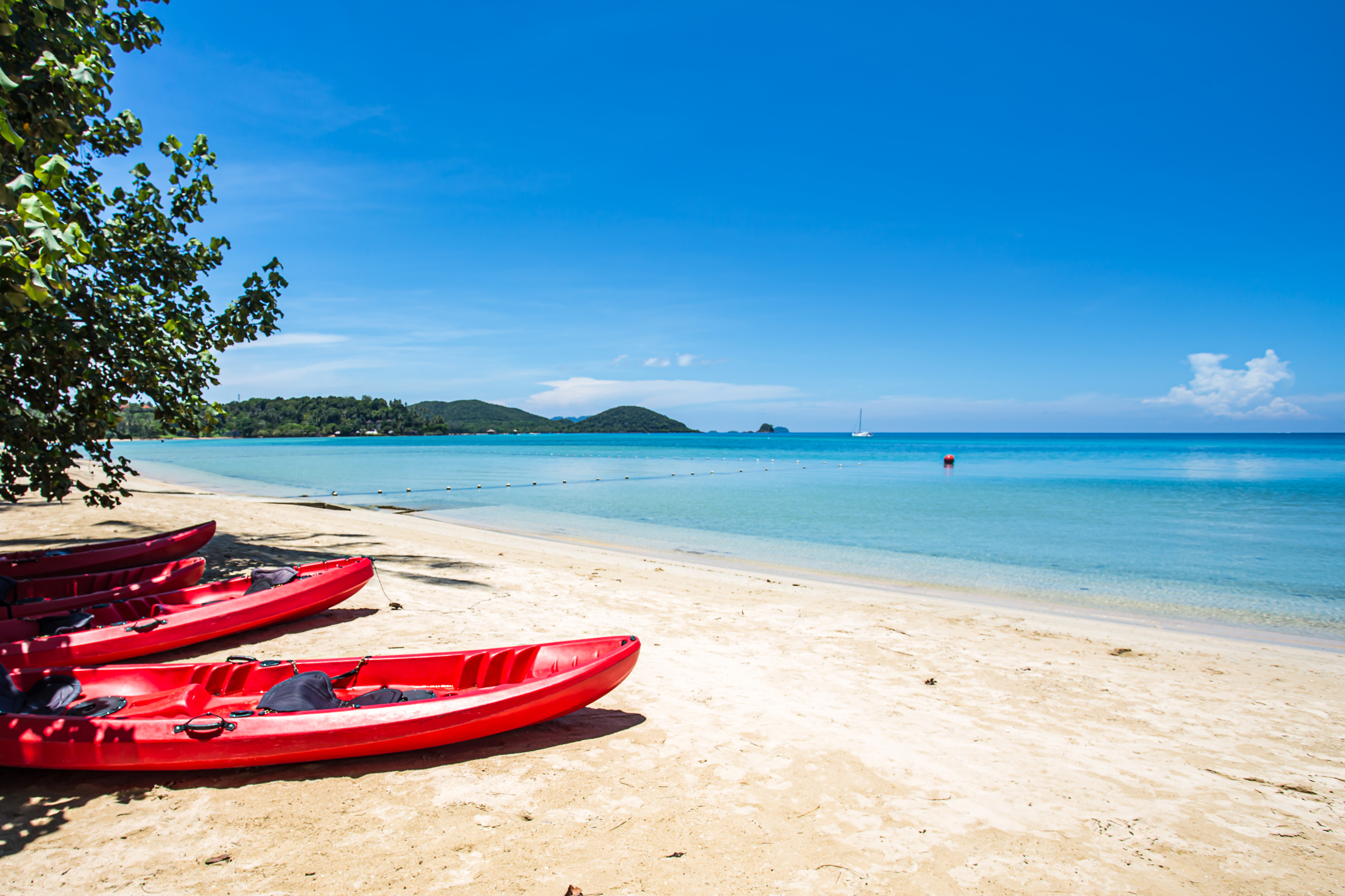 Shutterstock 1923390941 (Kayak On White Sand Beach On Day Noon Light.)