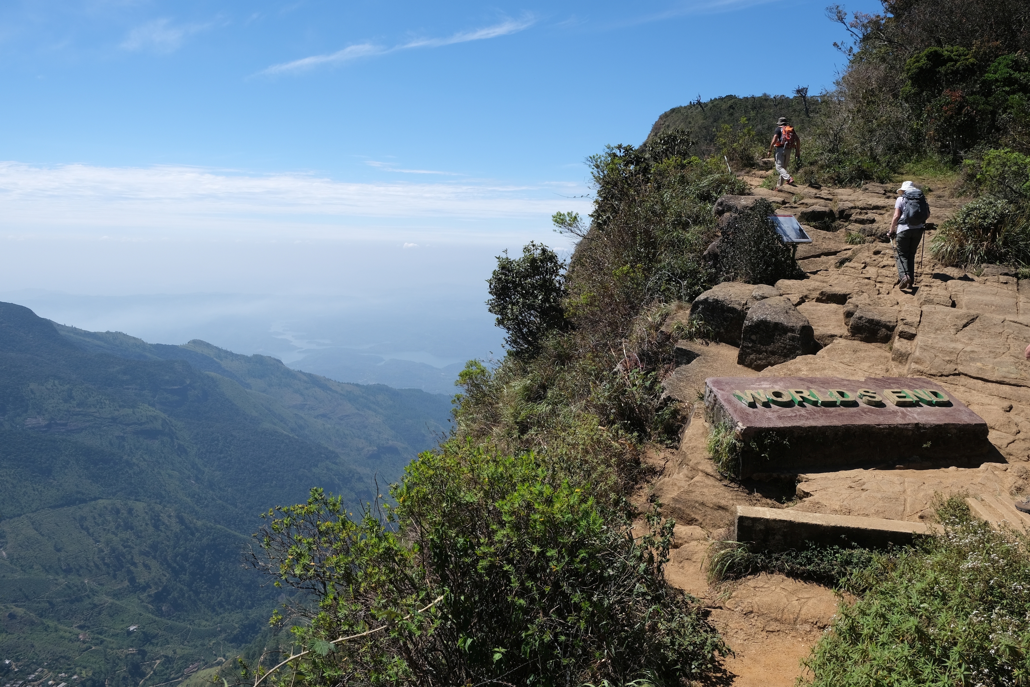 Shutterstock 2444842815 Beautiful Scenery Of Horton Plains National Park In Nuwara Eliya, Sri Lanka. Silhouette Of Hiking People To Viewpoint On Cliff Named End Of World.
